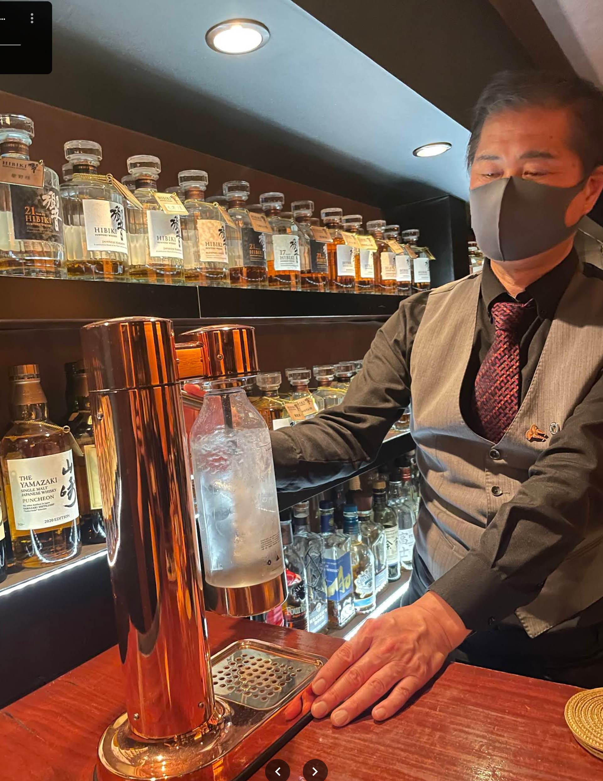 Bar owner preparing carbonated water